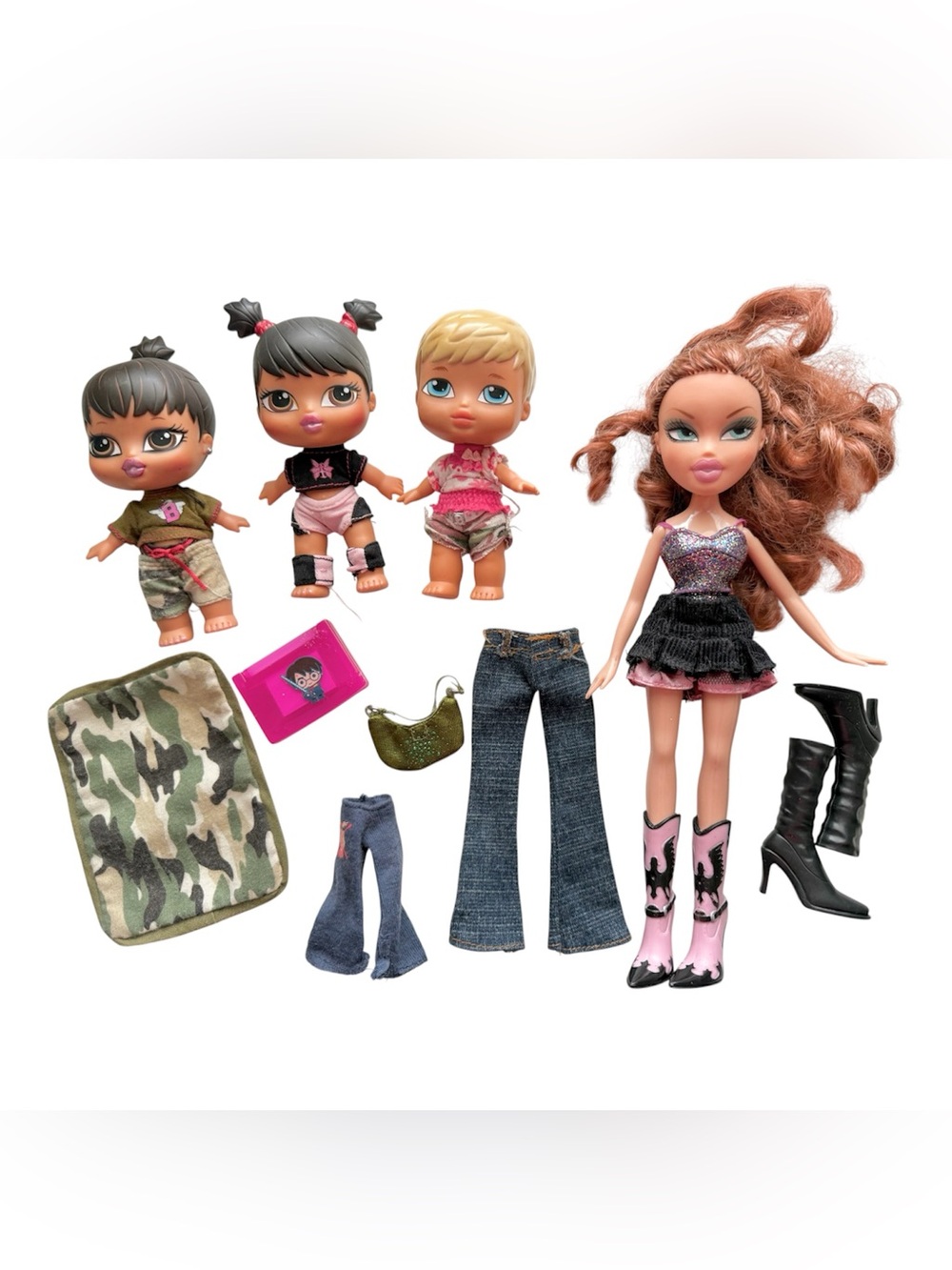 Bratz Kid Sister and Bratz Baby figures along with assorted doll clothing